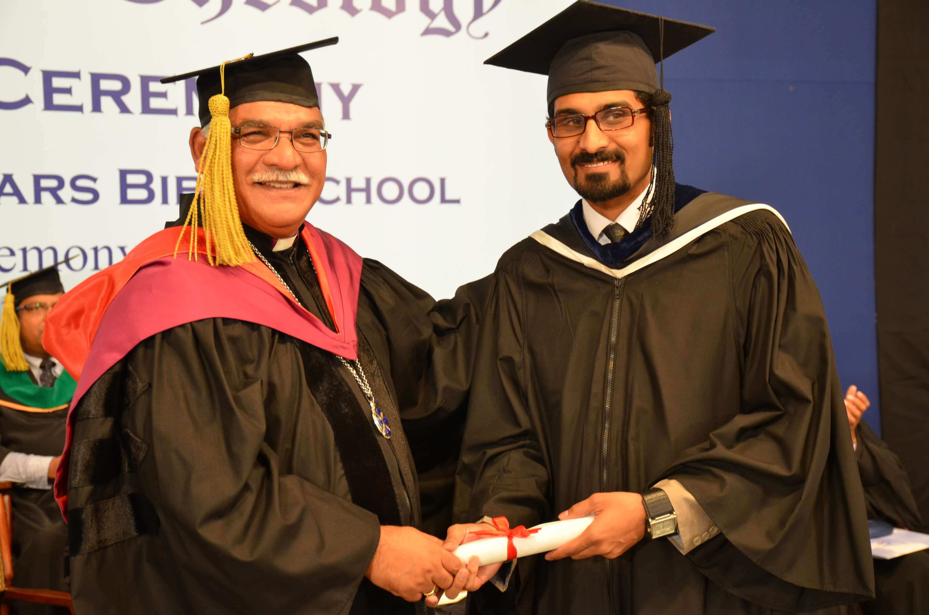 Shaleem Robert receiving his degree